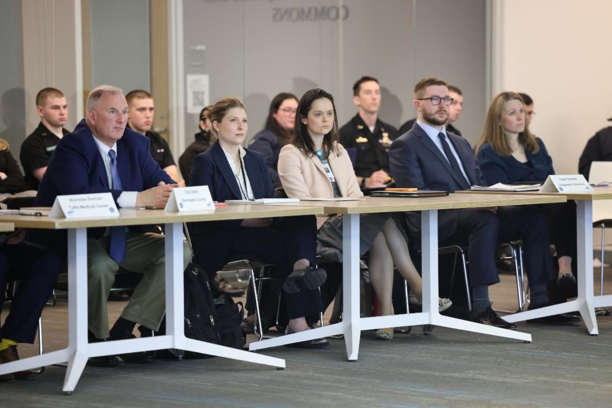 emergency managers sit facing legislators