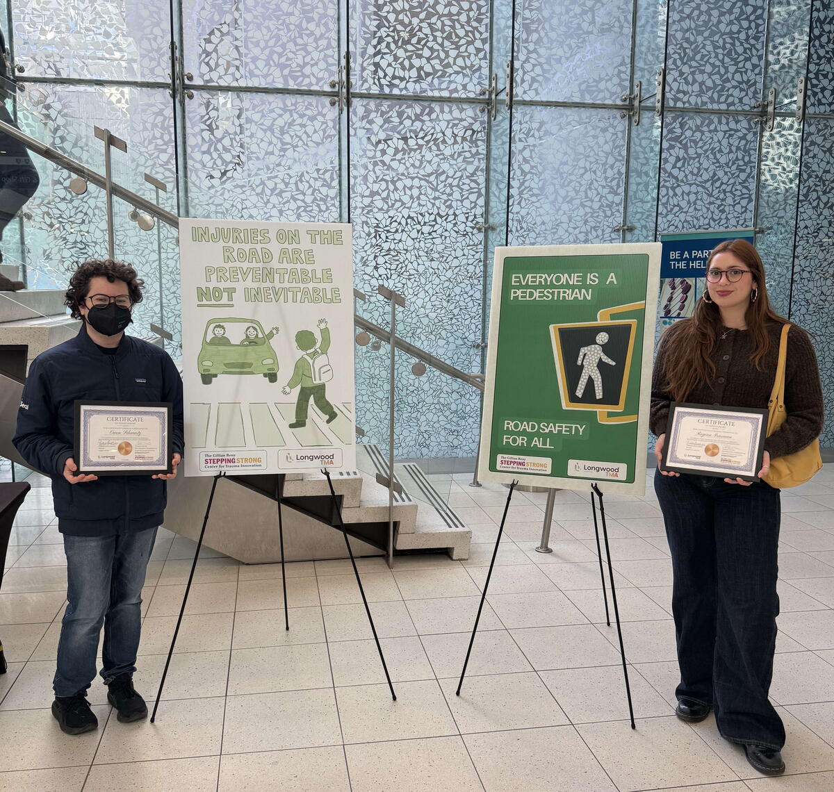 student winners with their artwork